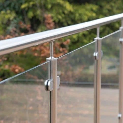 A glass balustrade with brushed stainless steel posts